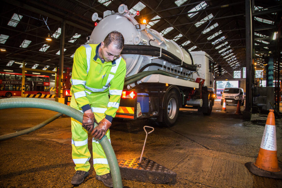 Express Clear Solutions Employee Extracting Liquid Waste